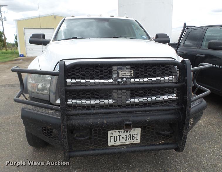 image for item DD1164 2014 Dodge Ram 5500 Crew Cab flatbed truck