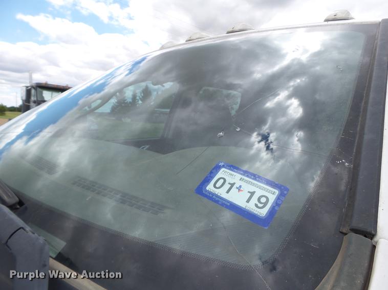 image for item DD1164 2014 Dodge Ram 5500 Crew Cab flatbed truck