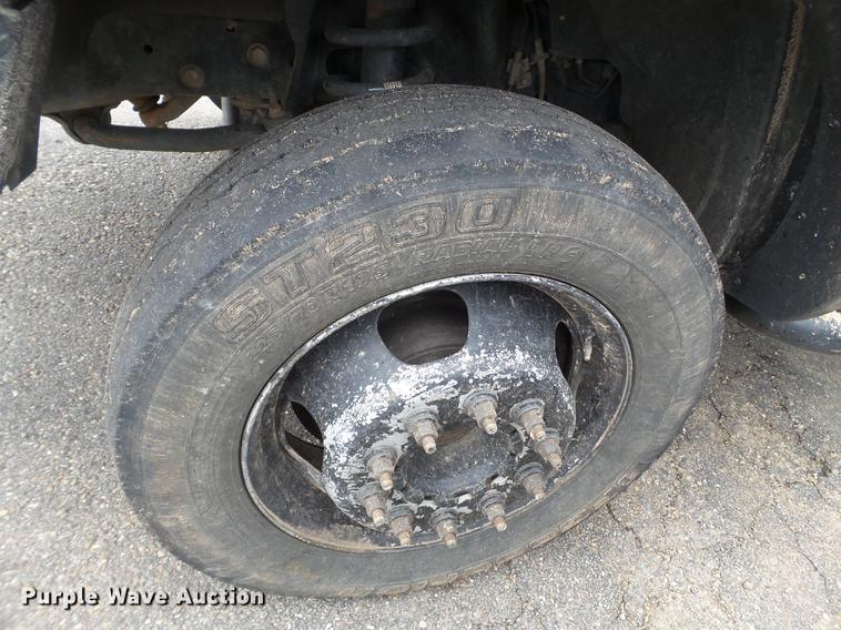 image for item DD1164 2014 Dodge Ram 5500 Crew Cab flatbed truck