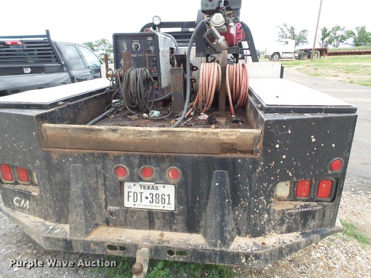 image for item DD1164 2014 Dodge Ram 5500 Crew Cab flatbed truck