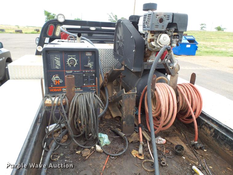 image for item DD1164 2014 Dodge Ram 5500 Crew Cab flatbed truck