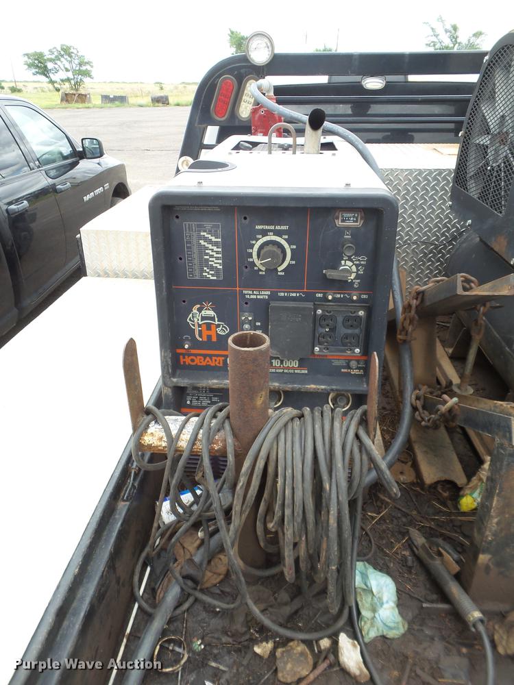 image for item DD1164 2014 Dodge Ram 5500 Crew Cab flatbed truck