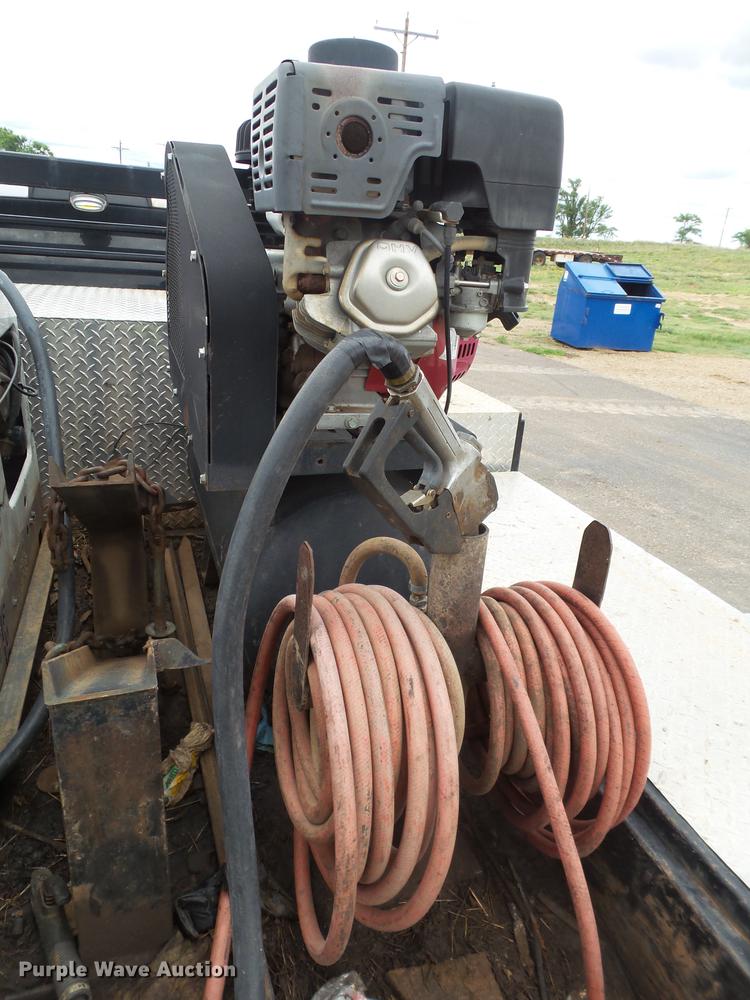 image for item DD1164 2014 Dodge Ram 5500 Crew Cab flatbed truck