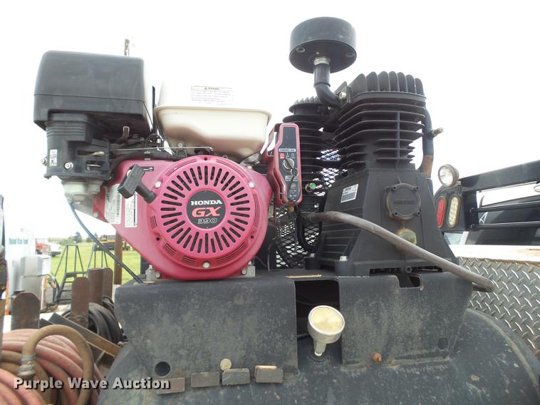 image for item DD1164 2014 Dodge Ram 5500 Crew Cab flatbed truck