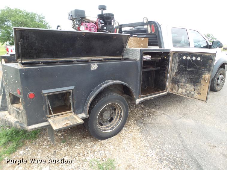 image for item DD1164 2014 Dodge Ram 5500 Crew Cab flatbed truck