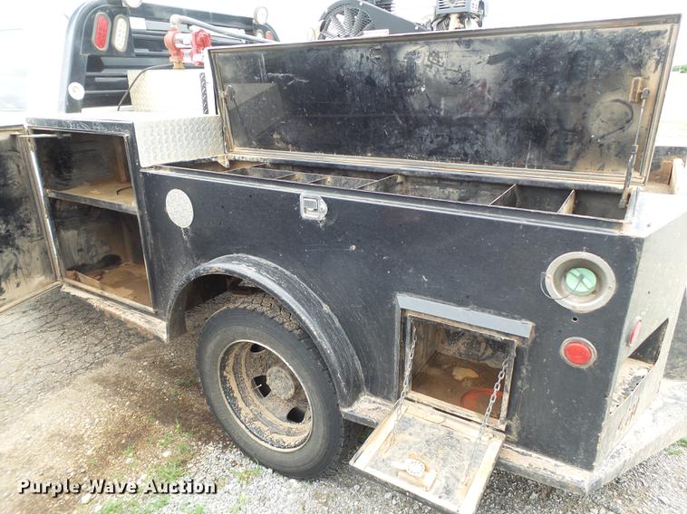 image for item DD1164 2014 Dodge Ram 5500 Crew Cab flatbed truck