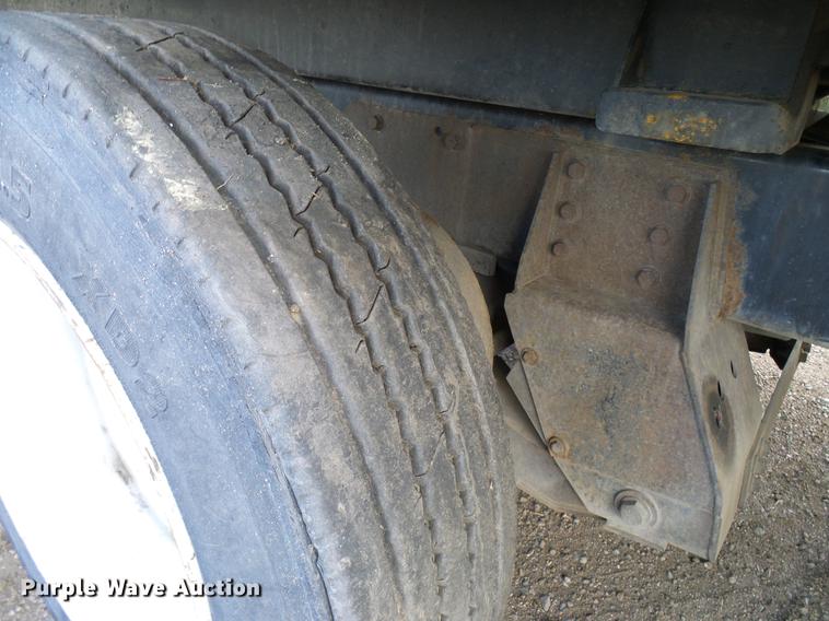 image for item DD8288 2000 Sterling L7500 rollback truck