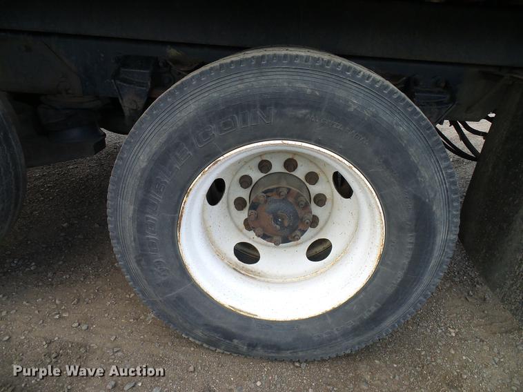 image for item DD8288 2000 Sterling L7500 rollback truck