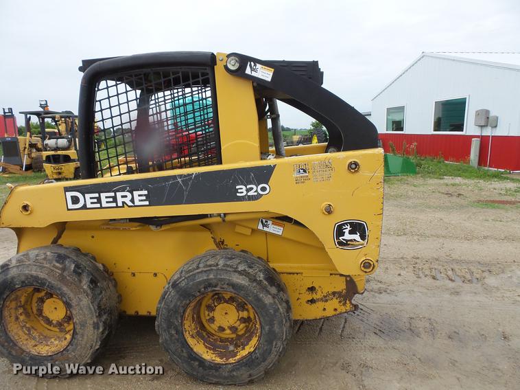 image for item DV9365 2007 John Deere 320 skid steer