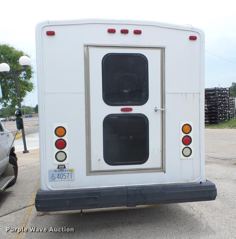 image for item EI9849 2004 Ford E350 Super Duty shuttle bus