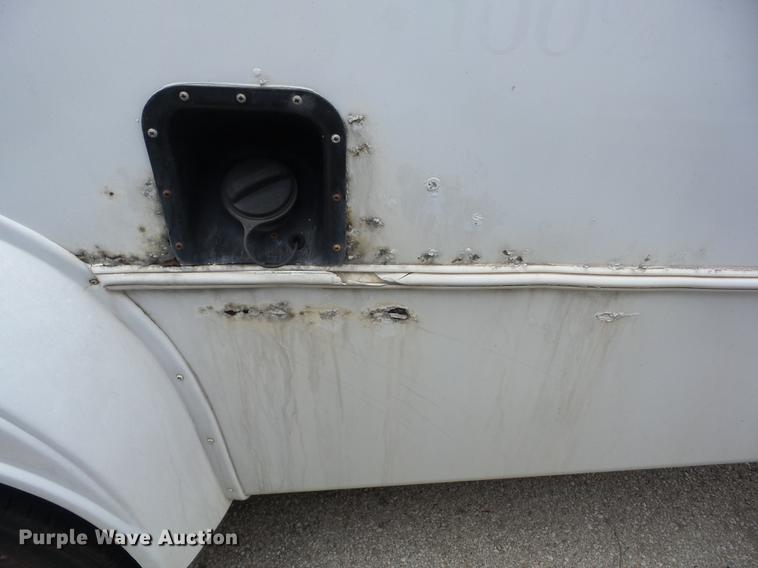 image for item EI9849 2004 Ford E350 Super Duty shuttle bus