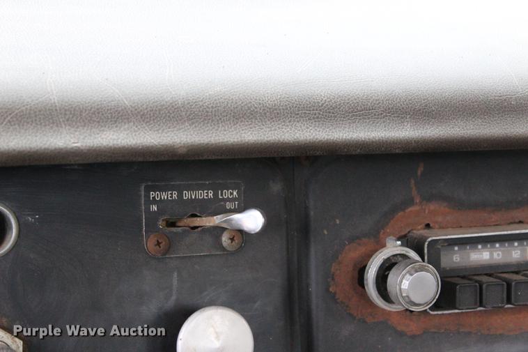 image for item BE9343 1980 International G25 flatbed winch truck