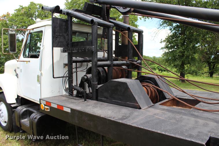 image for item BE9343 1980 International G25 flatbed winch truck