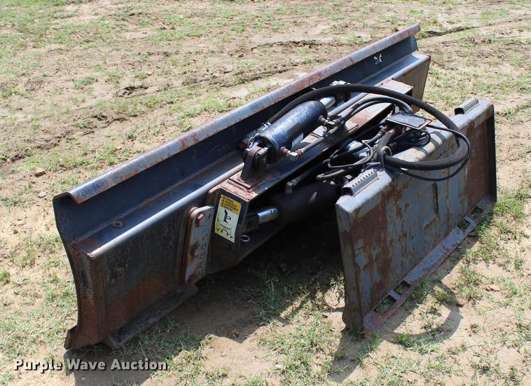 image for item EK9566 Grouser steel four way skid steer blade