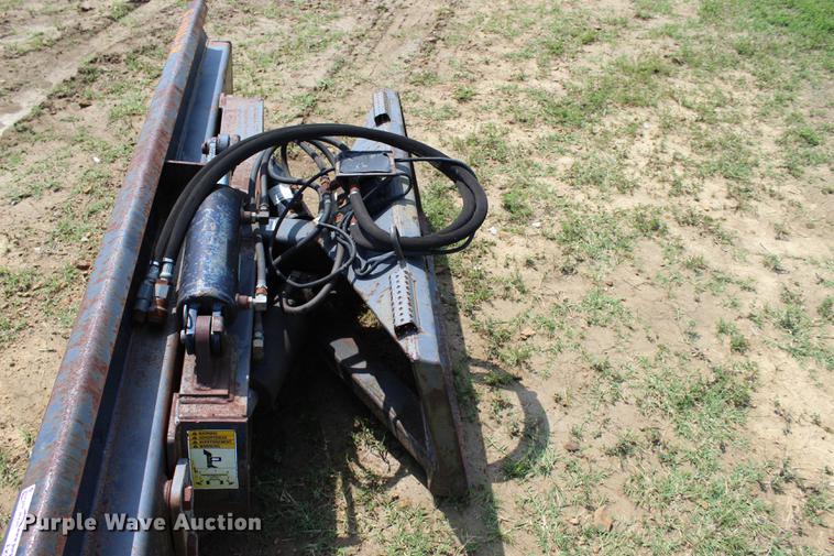 image for item EK9566 Grouser steel four way skid steer blade