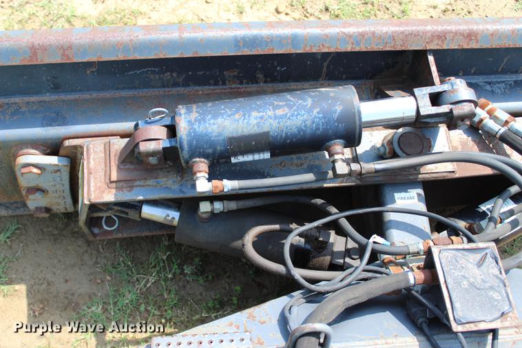 image for item EK9566 Grouser steel four way skid steer blade