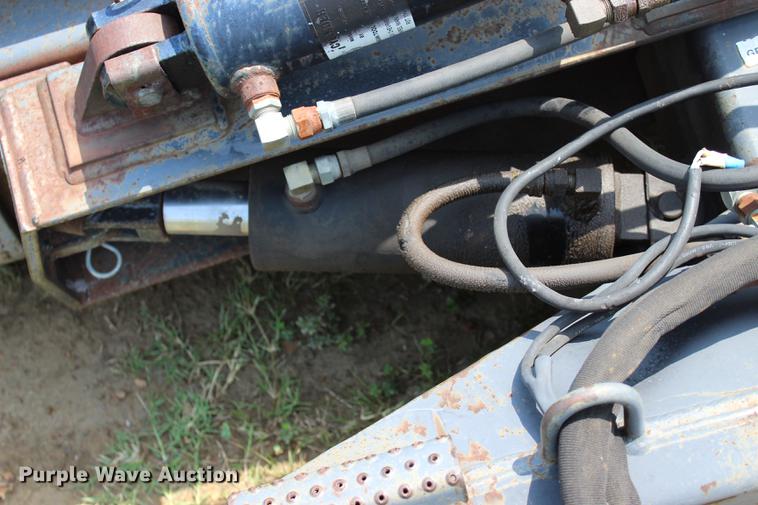 image for item EK9566 Grouser steel four way skid steer blade