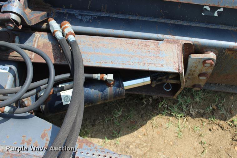 image for item EK9566 Grouser steel four way skid steer blade