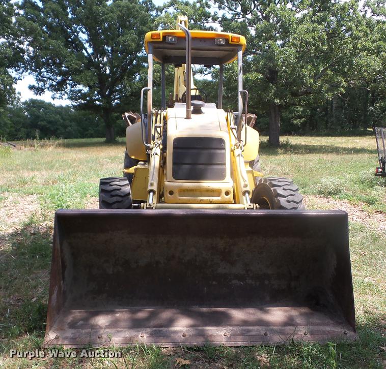 image for item K6269 New Holland 555E backhoe