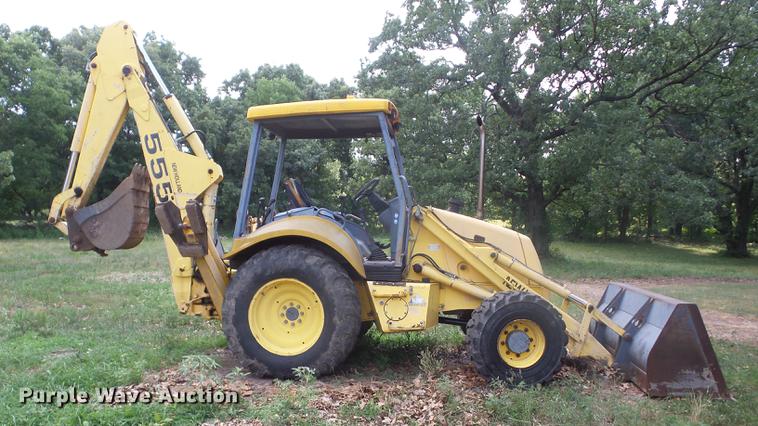 image for item K6269 New Holland 555E backhoe