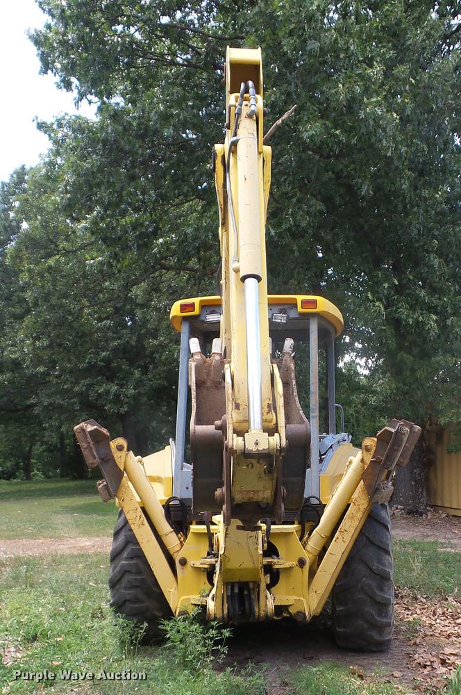 image for item K6269 New Holland 555E backhoe