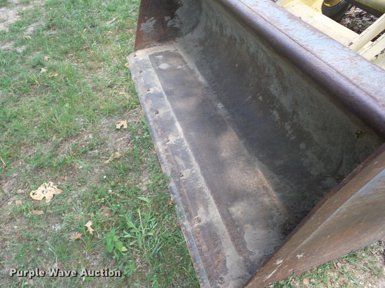 image for item K6269 New Holland 555E backhoe