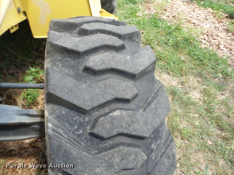 image for item K6269 New Holland 555E backhoe