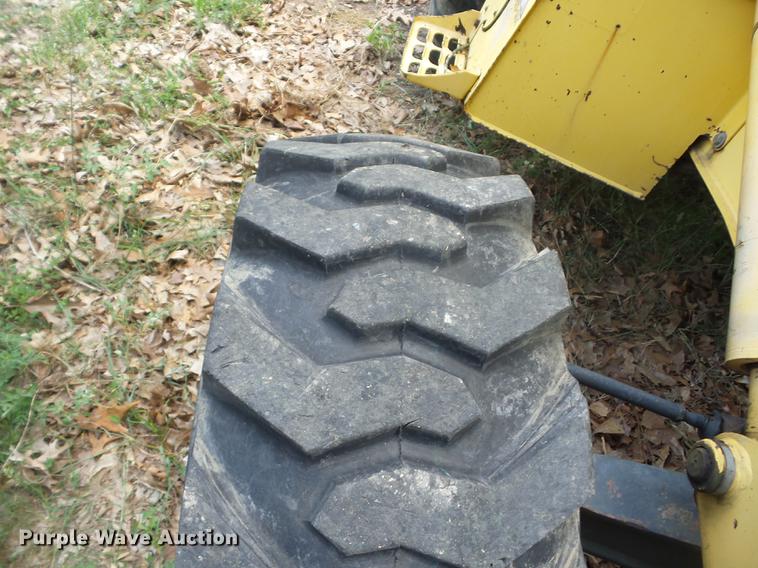 image for item K6269 New Holland 555E backhoe