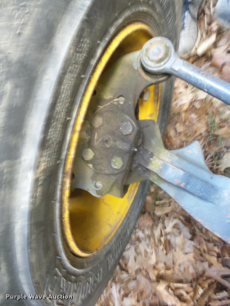 image for item K6269 New Holland 555E backhoe