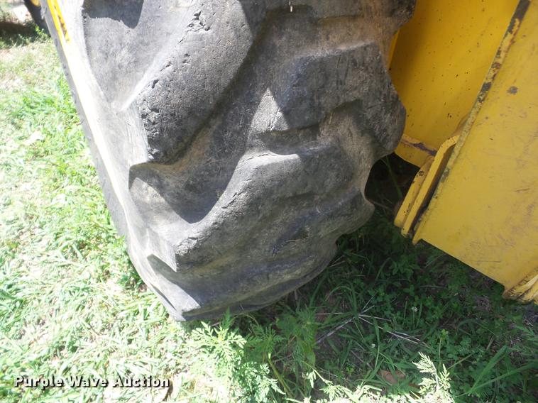 image for item K6269 New Holland 555E backhoe