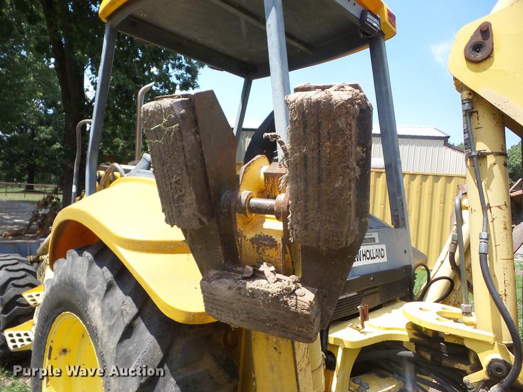 image for item K6269 New Holland 555E backhoe