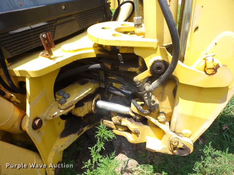 image for item K6269 New Holland 555E backhoe
