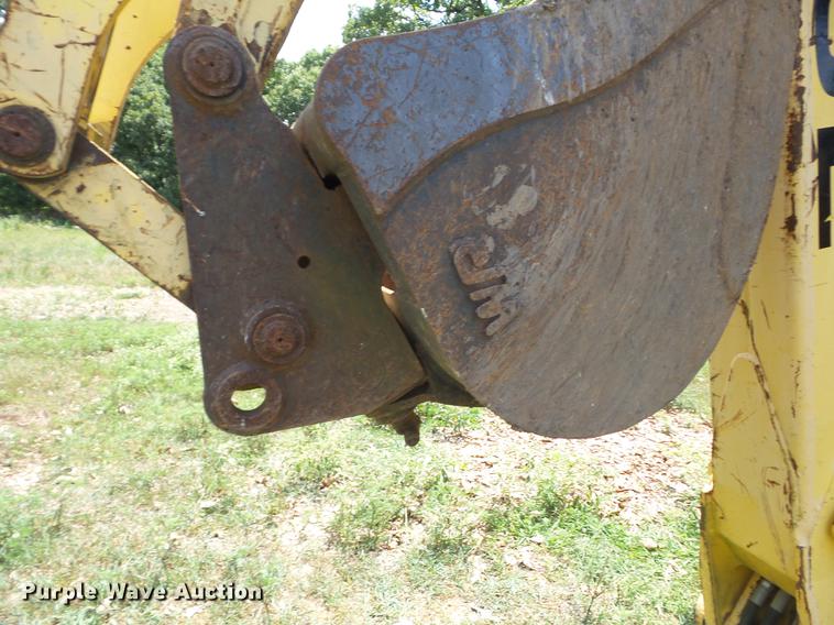 image for item K6269 New Holland 555E backhoe