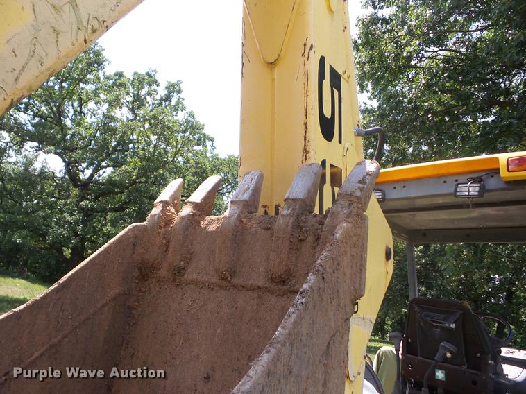 image for item K6269 New Holland 555E backhoe