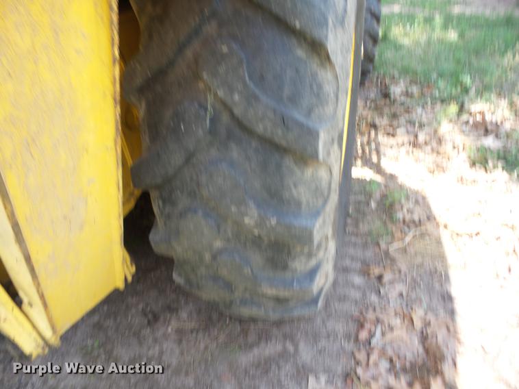 image for item K6269 New Holland 555E backhoe