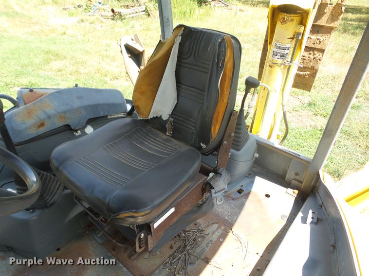 image for item K6269 New Holland 555E backhoe