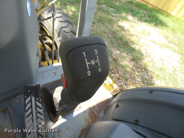 image for item K6269 New Holland 555E backhoe