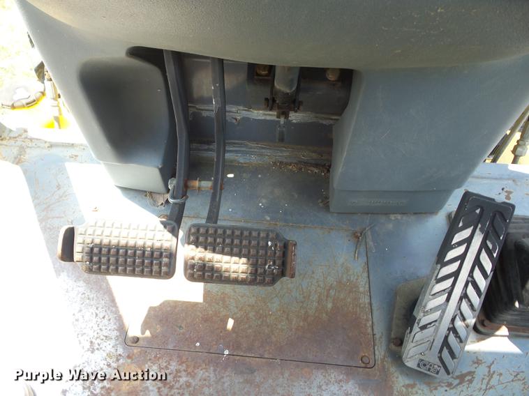 image for item K6269 New Holland 555E backhoe