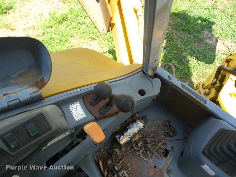 image for item K6269 New Holland 555E backhoe