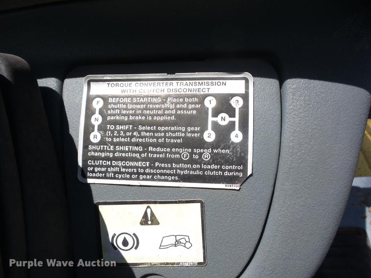 image for item K6269 New Holland 555E backhoe