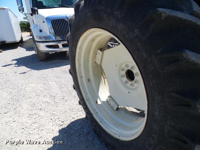 image for item DD8614 1998 New Holland TV140 bi-directional 4WD tractor