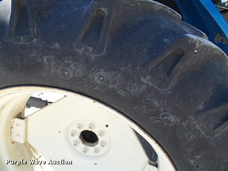 image for item DD8614 1998 New Holland TV140 bi-directional 4WD tractor