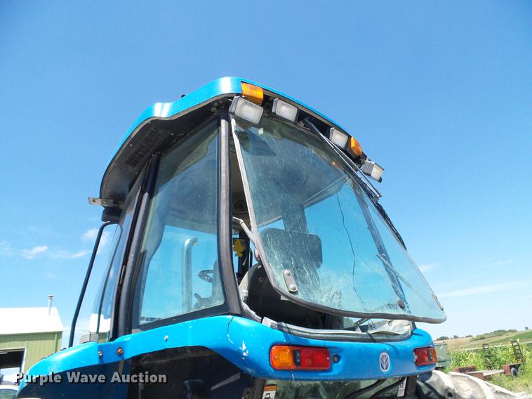 image for item DD8614 1998 New Holland TV140 bi-directional 4WD tractor