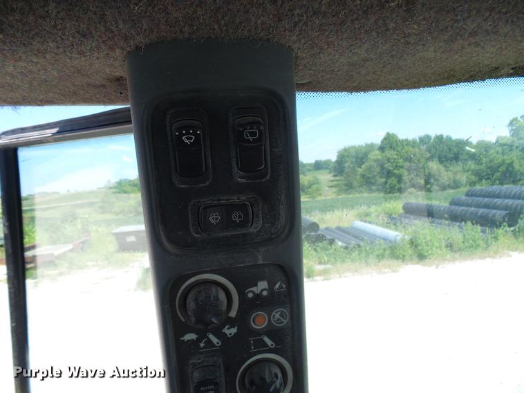 image for item DD8614 1998 New Holland TV140 bi-directional 4WD tractor