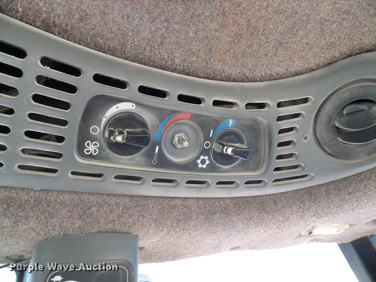 image for item DD8614 1998 New Holland TV140 bi-directional 4WD tractor