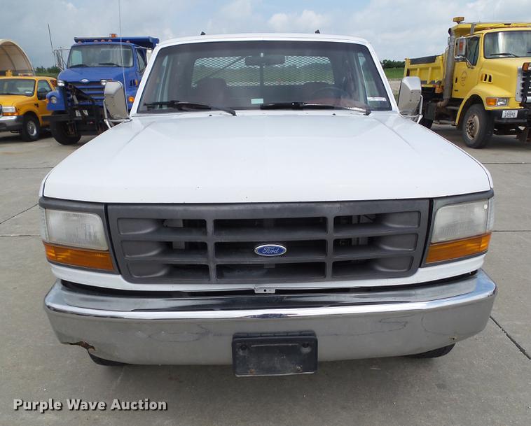 image for item DZ9380 1992 Ford F250 SuperCab flatbed pickup truck