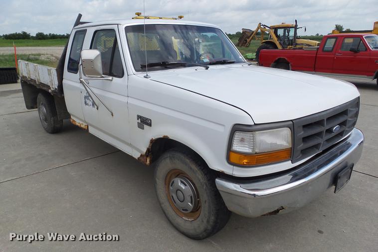 image for item DZ9380 1992 Ford F250 SuperCab flatbed pickup truck