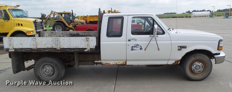 image for item DZ9380 1992 Ford F250 SuperCab flatbed pickup truck