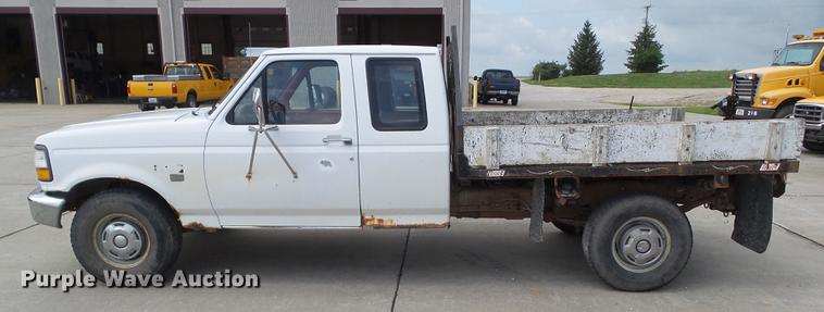 image for item DZ9380 1992 Ford F250 SuperCab flatbed pickup truck