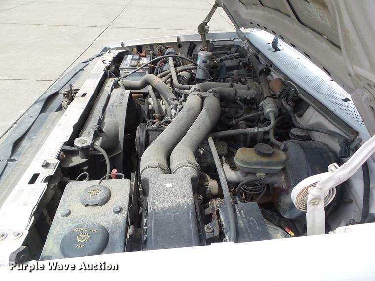 image for item DZ9380 1992 Ford F250 SuperCab flatbed pickup truck